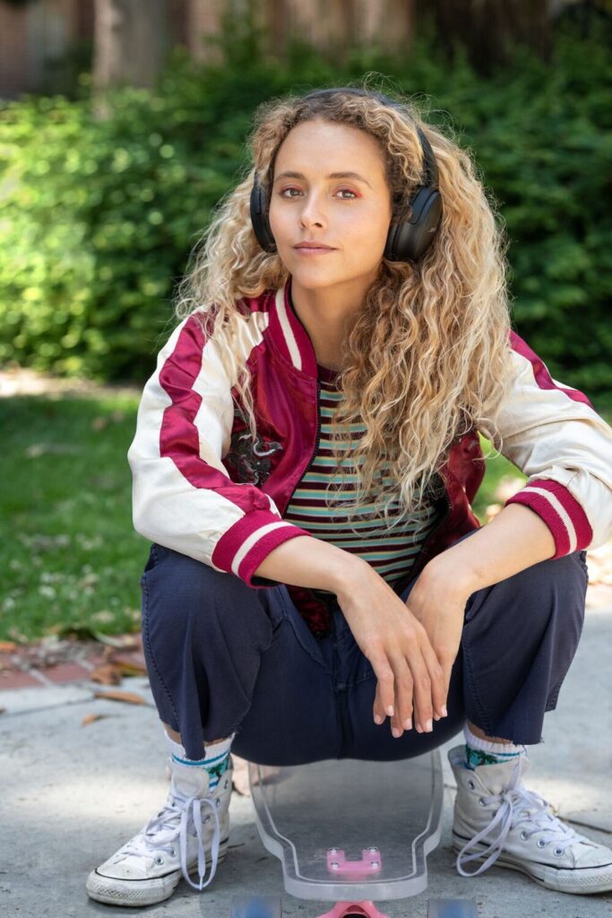 Person enjoying high-quality audio with comfortable Bose headphones.