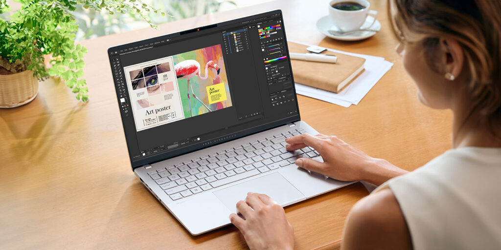 Asus Vivobook 15 laptop open on a desk, showcasing its slim design and keyboard, representing affordable productivity.