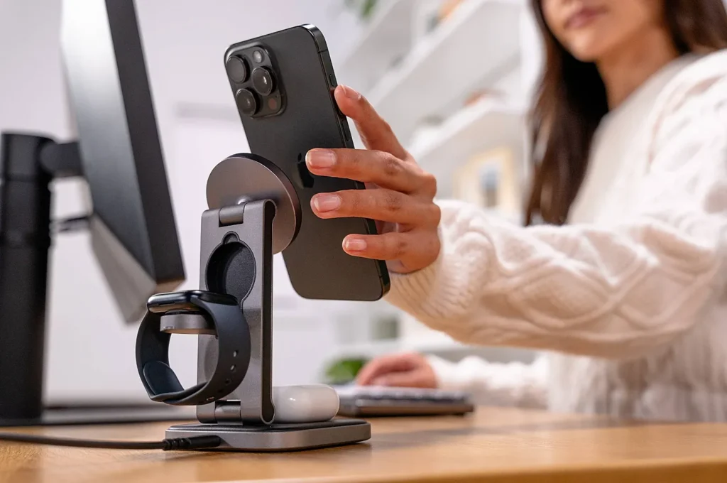 Mophie Power Banks & Accessories Review – Smart Charging Solutions? Mophie 3-in-1 wireless charging stand powering an iPhone, Apple Watch, and AirPods simultaneously.