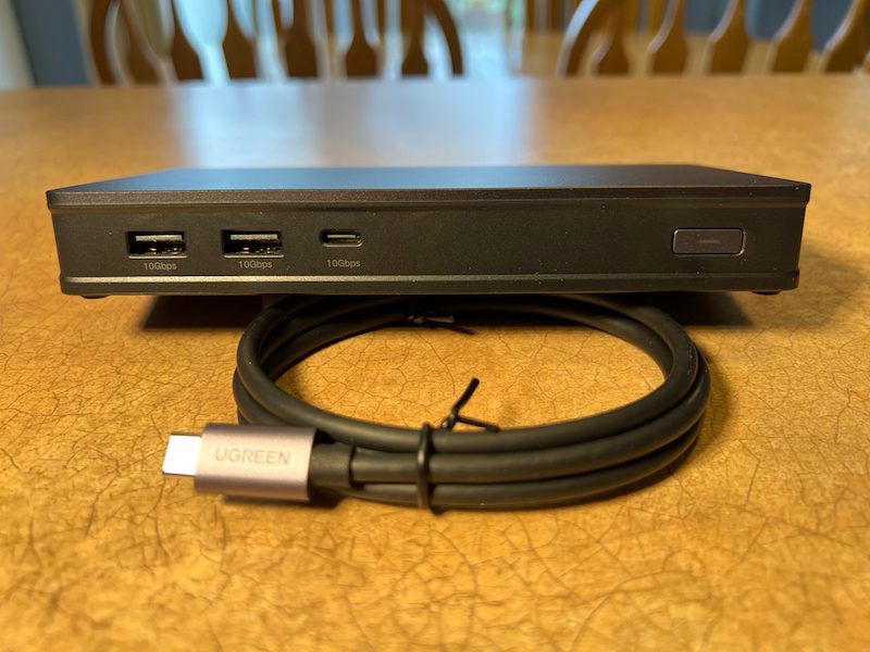 A close-up of Ugreen's durable, braided USB-C, HDMI, and DisplayPort cables, showcasing quality construction for creator setups.