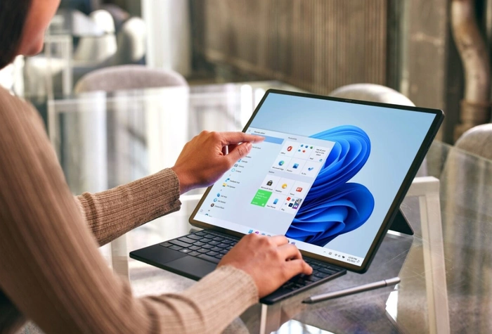 Versatile portable productivity gadget transitioning between tablet and laptop modes