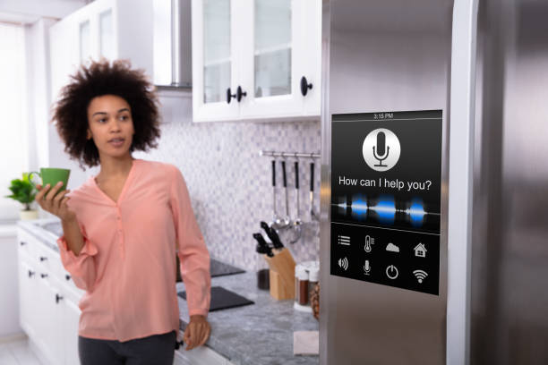 Person speaking to a smart oven while preparing a meal, hands-free cooking