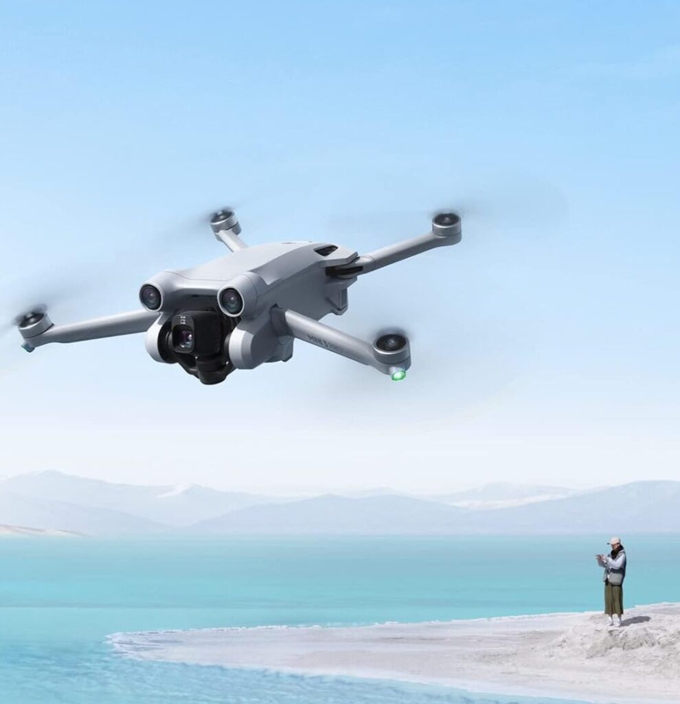 Compact mirrorless camera and foldable drone for capturing travel photos and videos in 2025