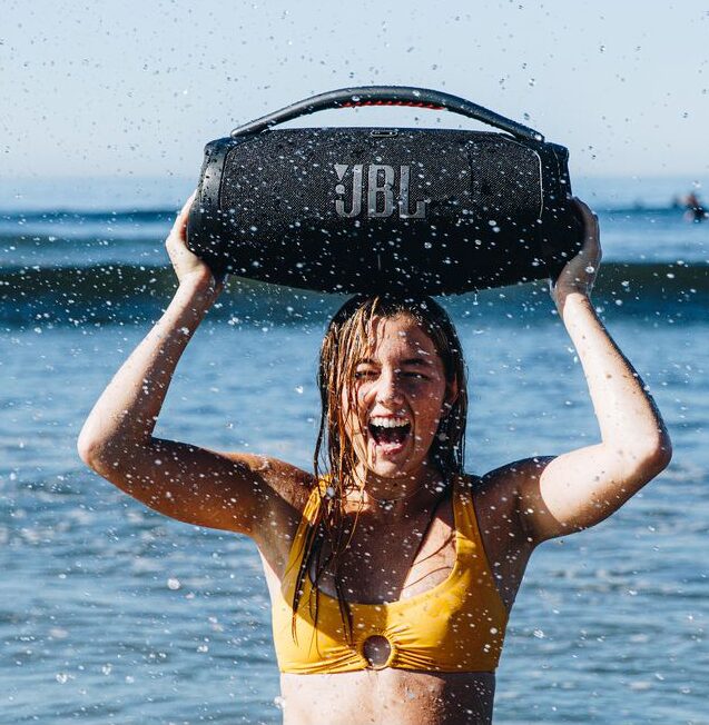 JBL Boombox 3 portable speaker with deep bass and long battery life, shown by a swimming pool