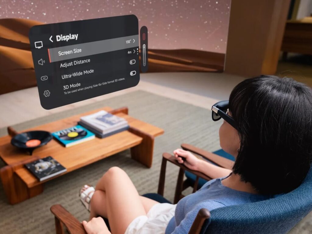 Top Trending Tech Gadgets Everyone is Buying in 2025 A person walking while wearing the XREAL One Pro smart glasses, Trending Tech Gadgets showcasing the immersive display.