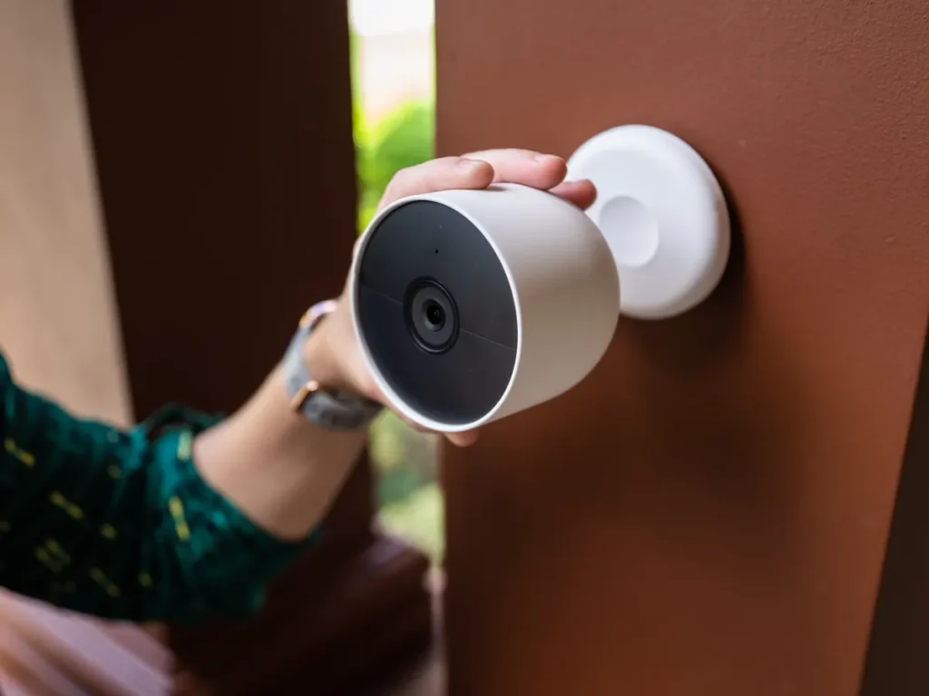 Ring vs. Google Nest: Which Smart Doorbell is Best in 2025? A visual comparison table of Ring Protect and Nest Aware subscription plans and features for smart doorbells