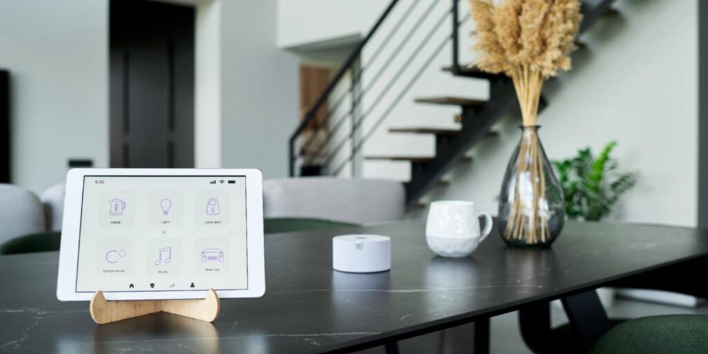 Top 10 Must-Have Gadgets of 2025 A 2025 smart home hub with a minimalist design, illustrating a central command for smart homes.